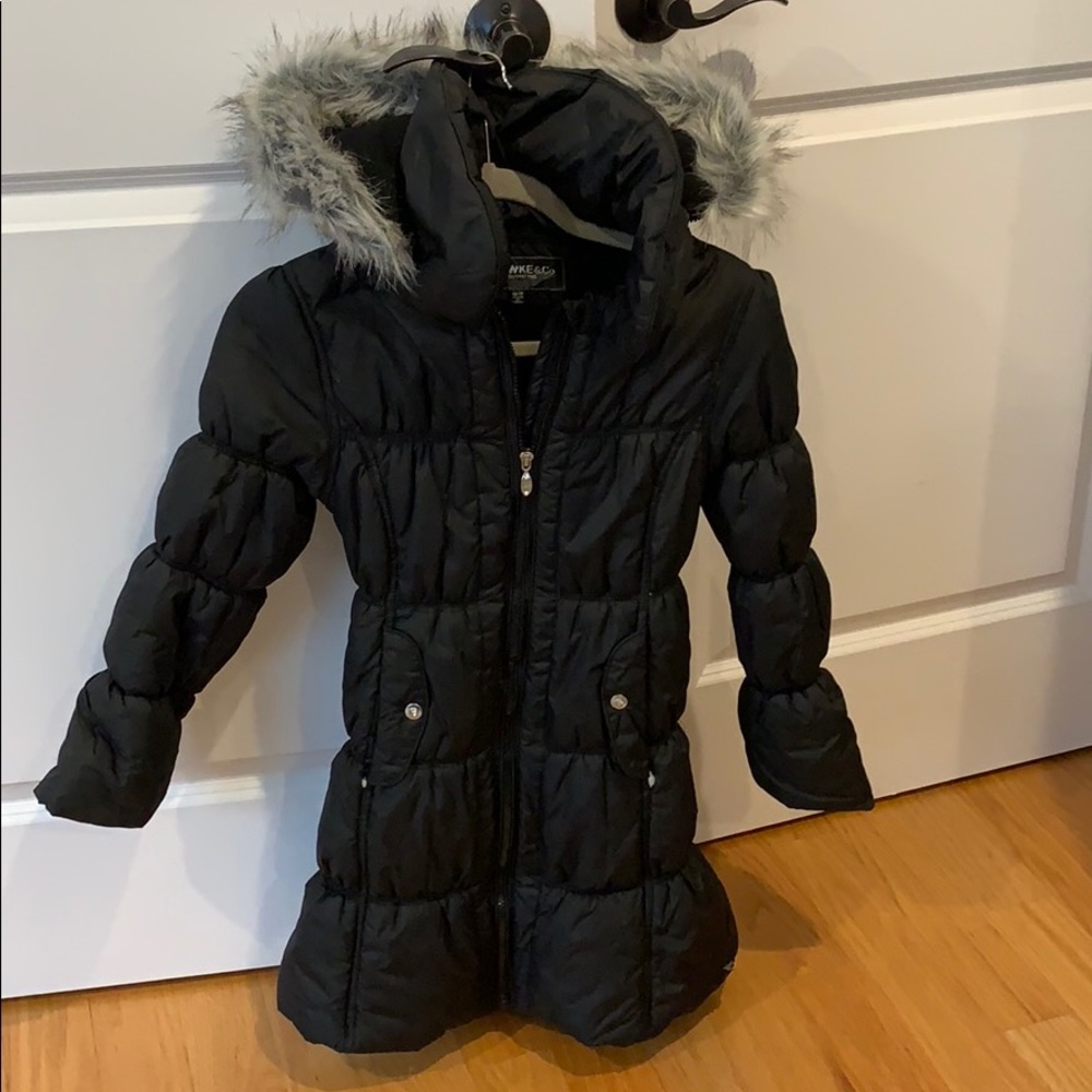 Black winter puffer coat by Hawks & Co Outfitter.